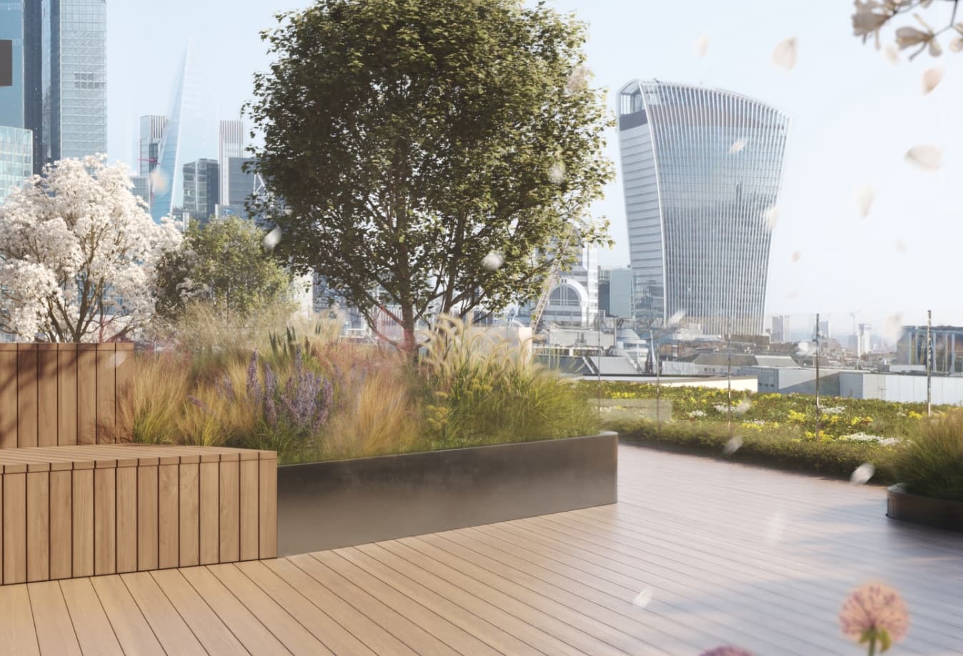 View of London skyline from the terrace, showing the plants and trees that are on the terrace.